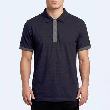 Baseline Polo Shirt in navy with a gray contrast placket and cuffs, front view