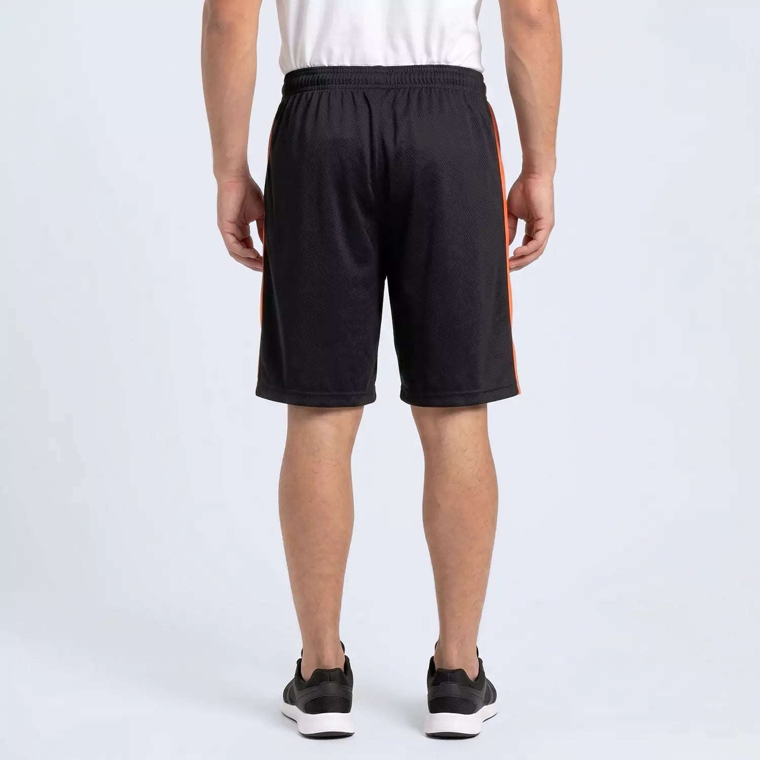 Back view of the black Blaze Panel Shorts with orange panel detail