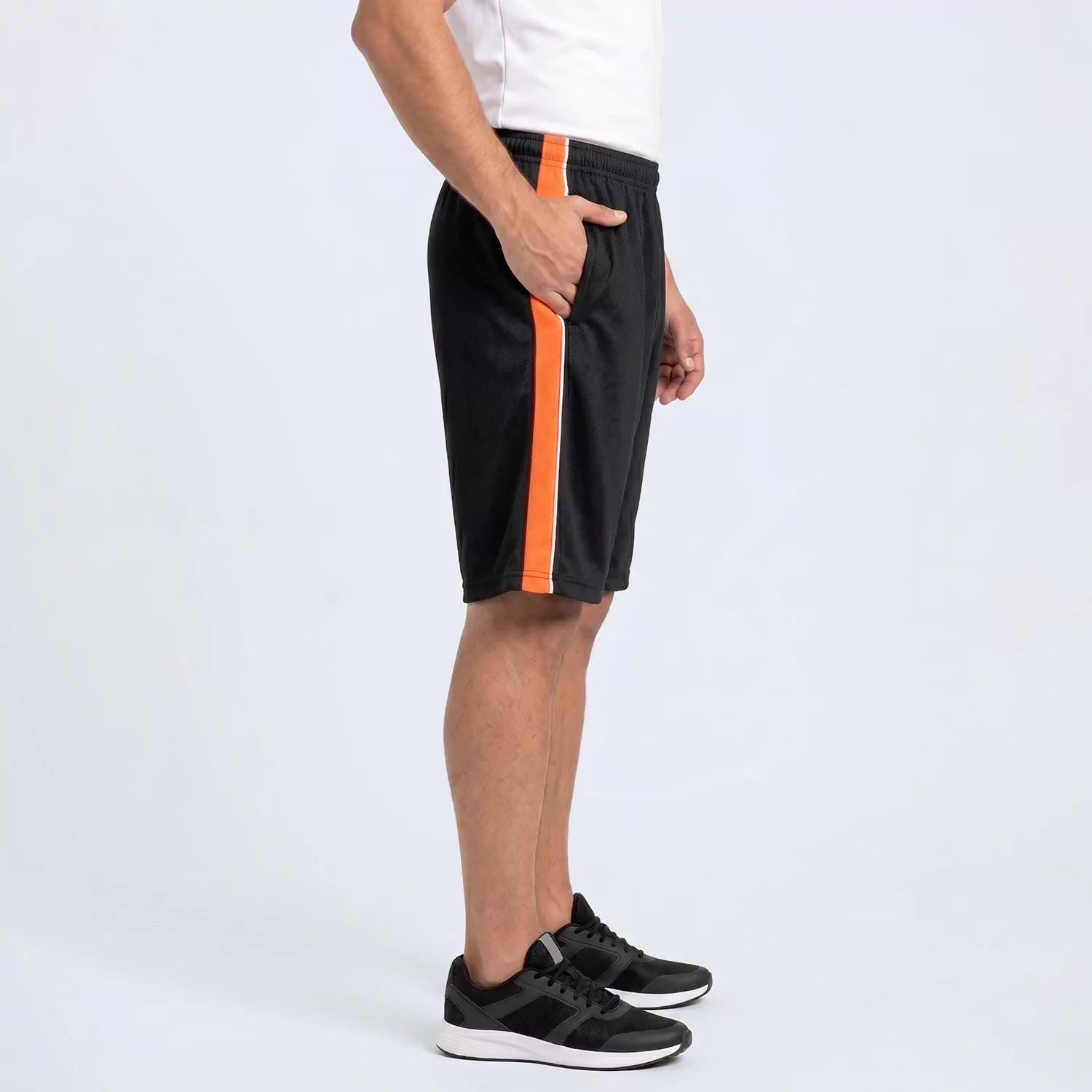 Man wearing the black Blaze Panel Shorts, showing the drawstring waist and side panel