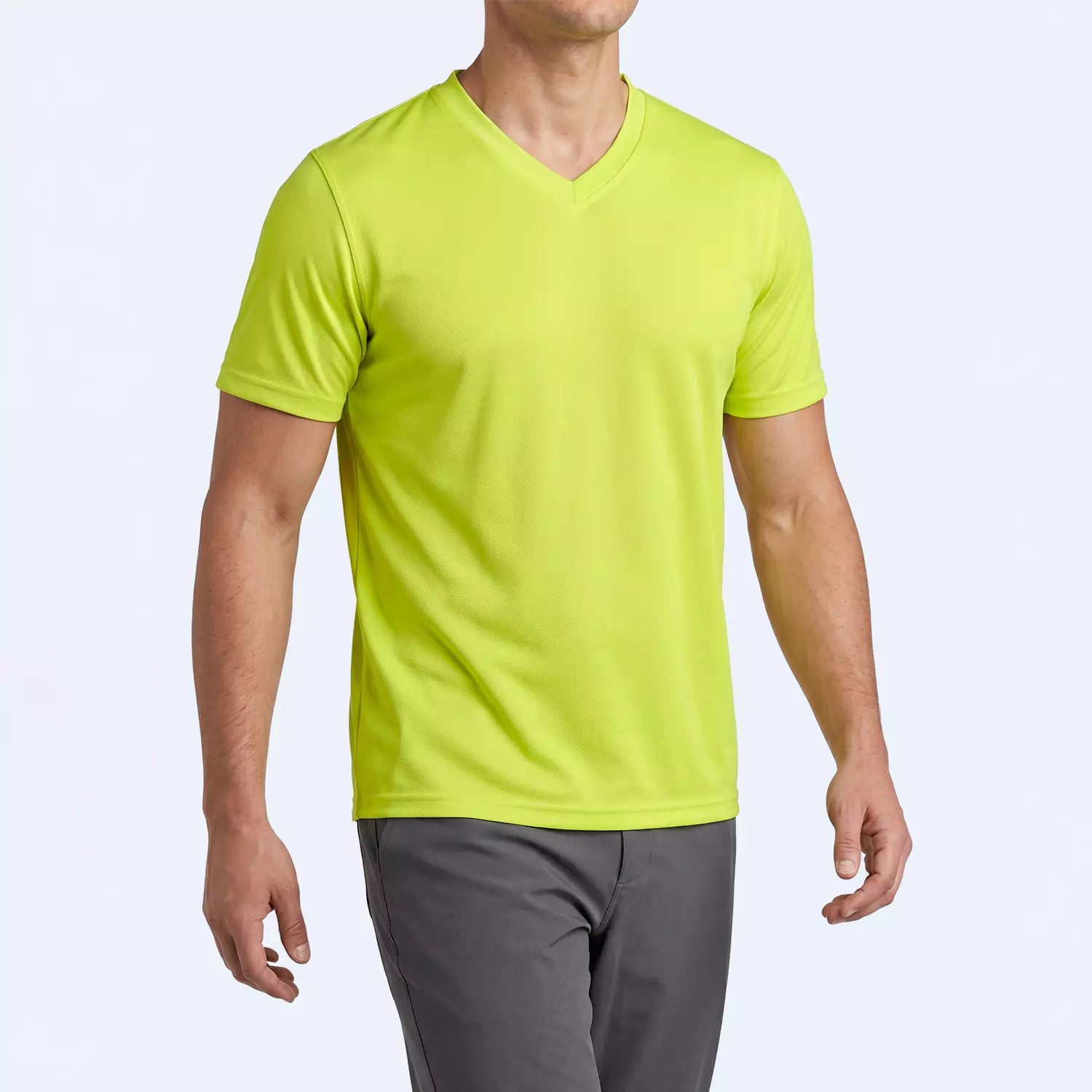 Man wearing the Crestline V-Neck T-Shirt in Citron with a slim fit through the body