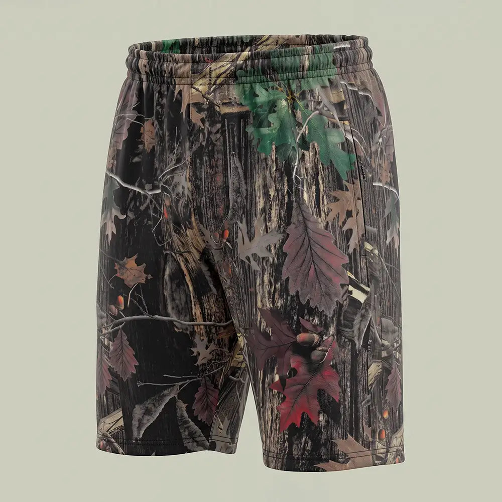 Custom printed athletic shorts with all-over jungle camo sublimation print, made by ausman Pakistan
