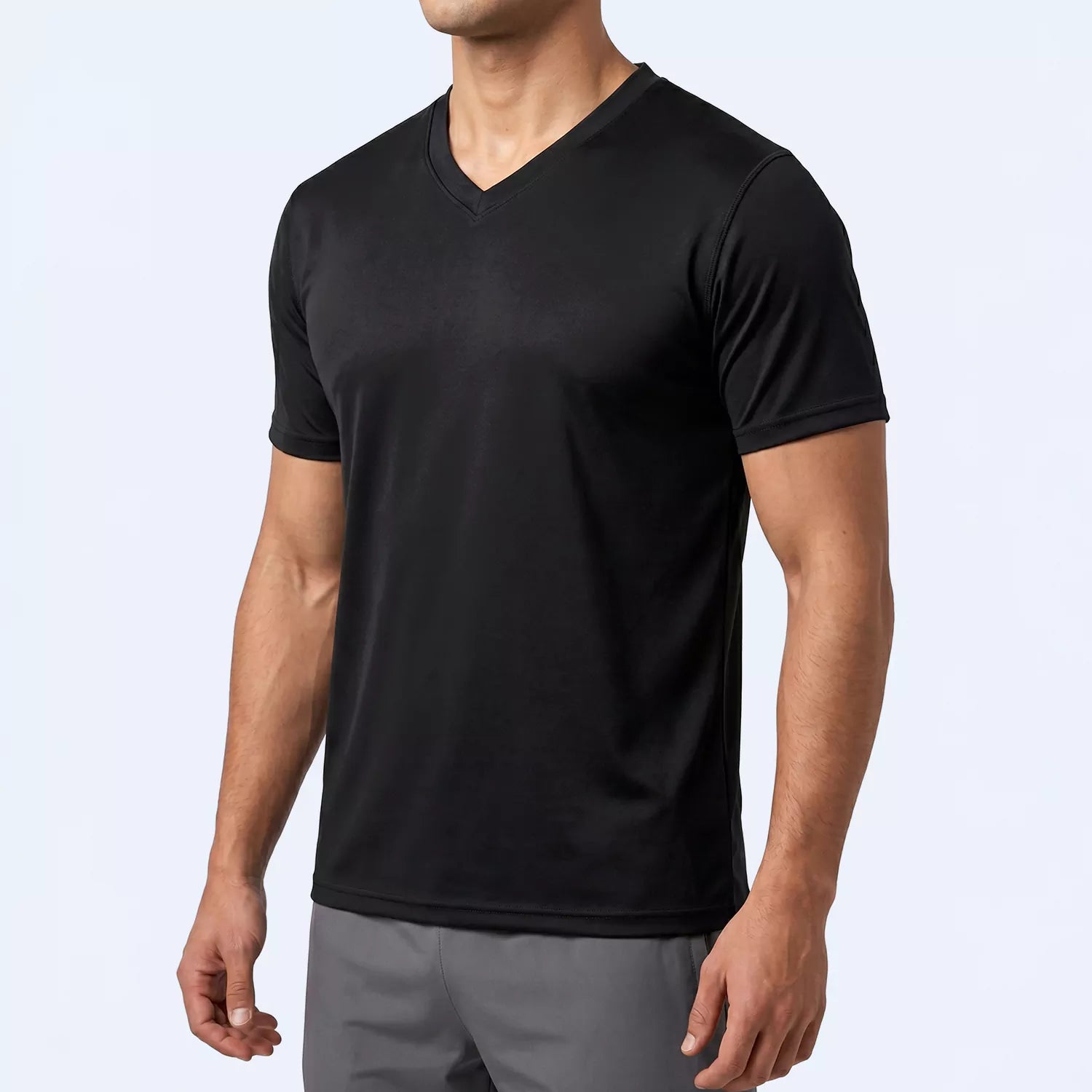 Side angle of the black Ember V-neck tee showing slim fit through the torso
