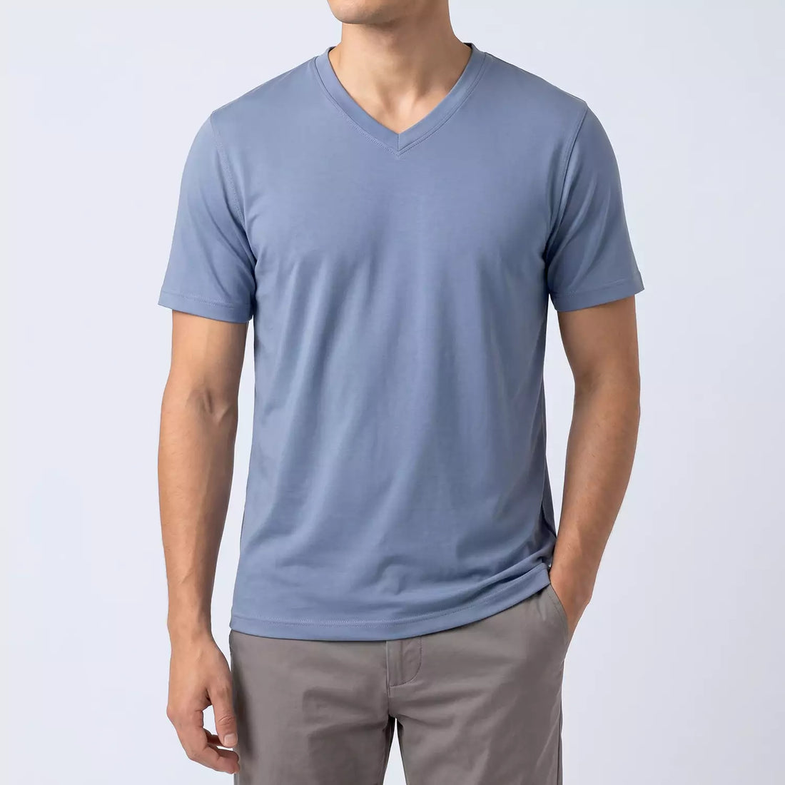 Ember V-neck t-shirt in dusty blue, front view showing bound V-neck edge