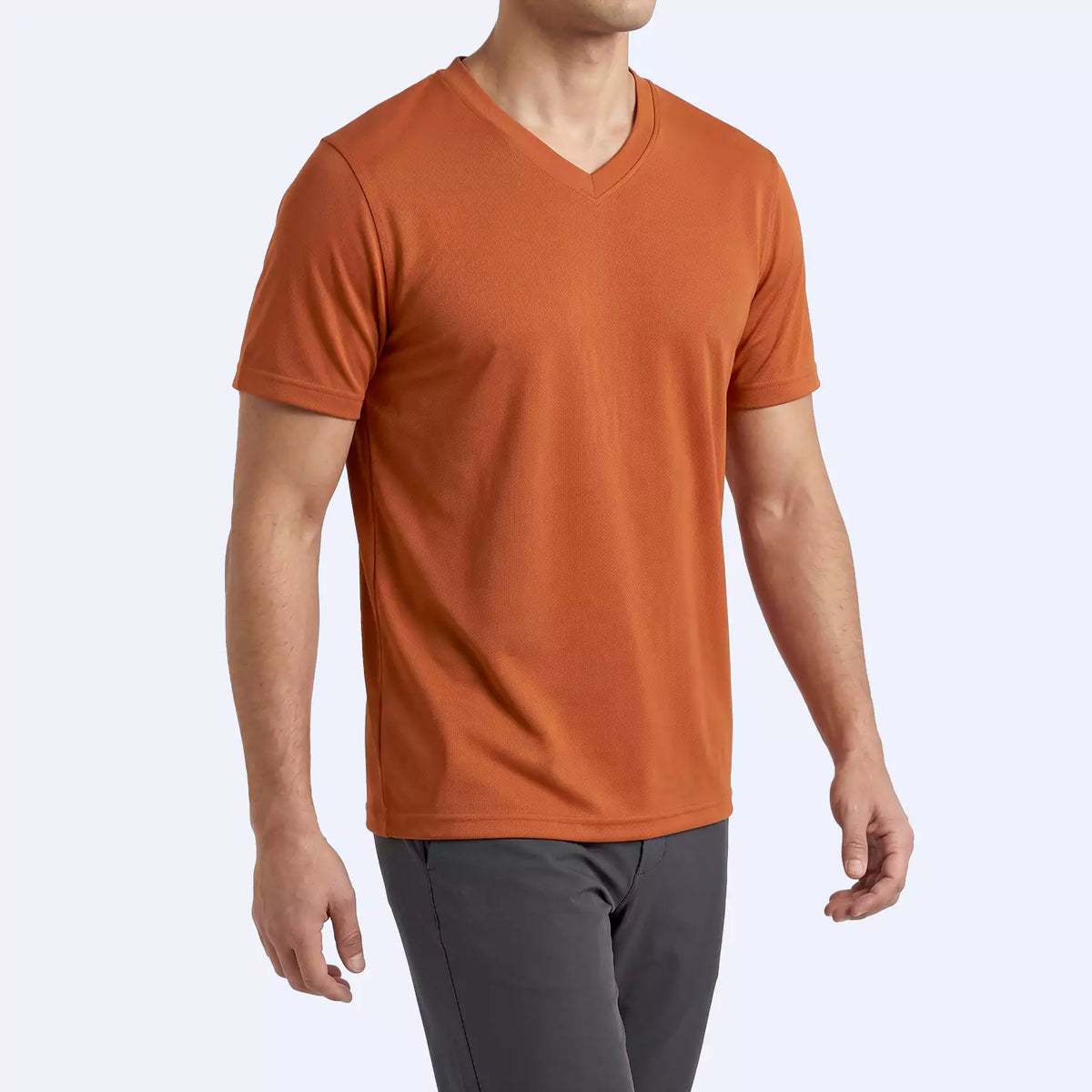 Close view of the rust polyester-elastane fabric on the Ember V-Neck T-Shirt
