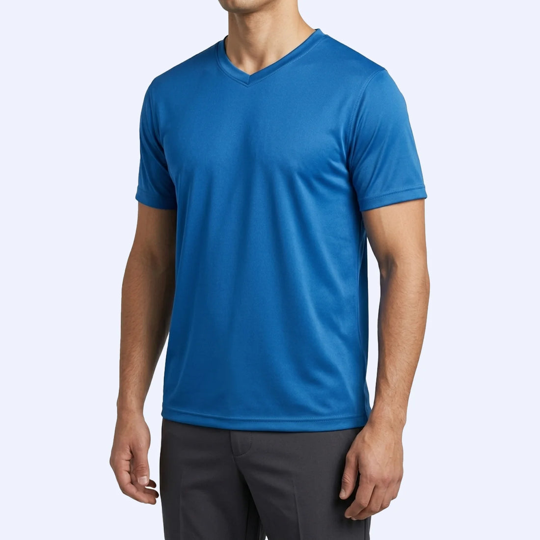Man wearing the Falcon V-Neck T-Shirt in blue, slim fit for gym and casual wear