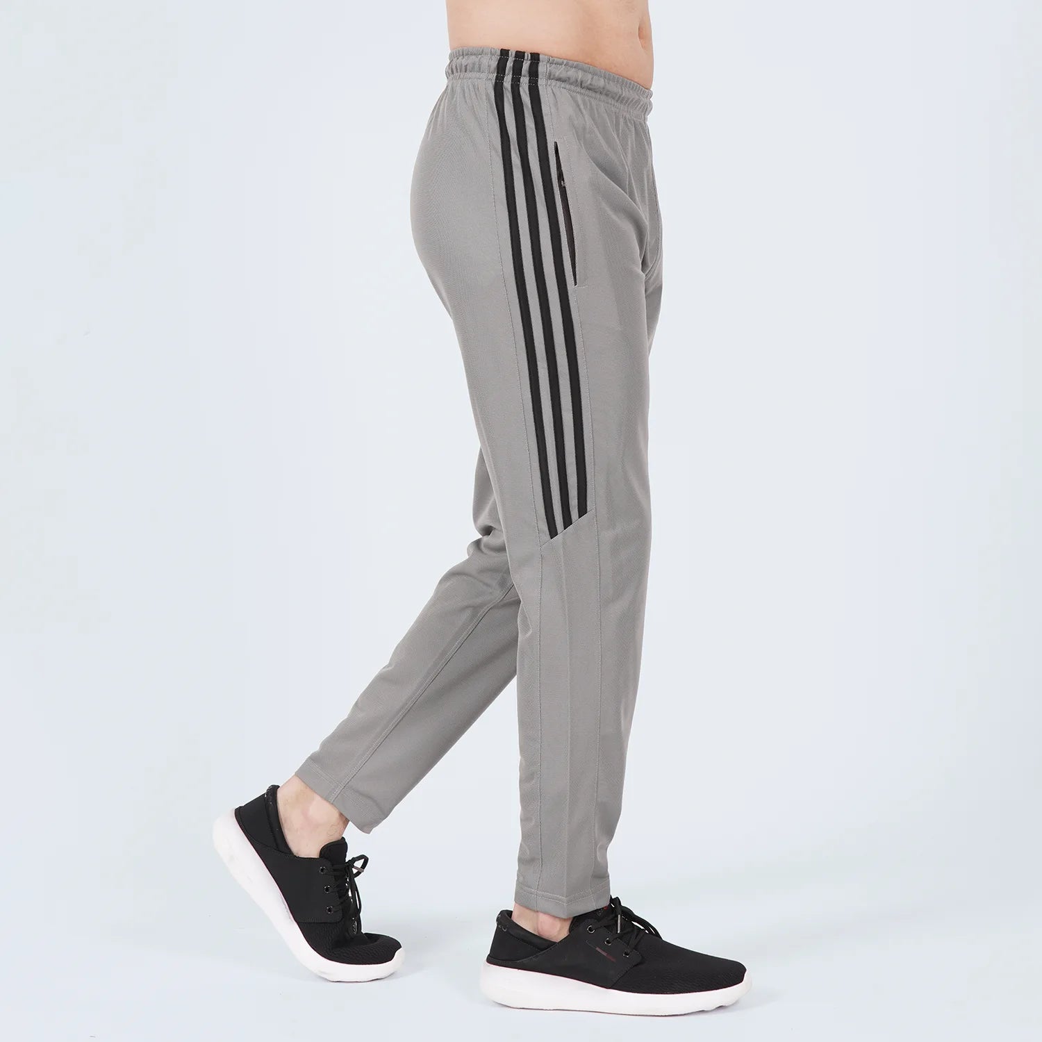 ausman HalfStripe Active Trouser Grey Black for men, slim fit Micro PK active trouser with black half-stripe detail and two pockets. men's trousers online shopping pakistan