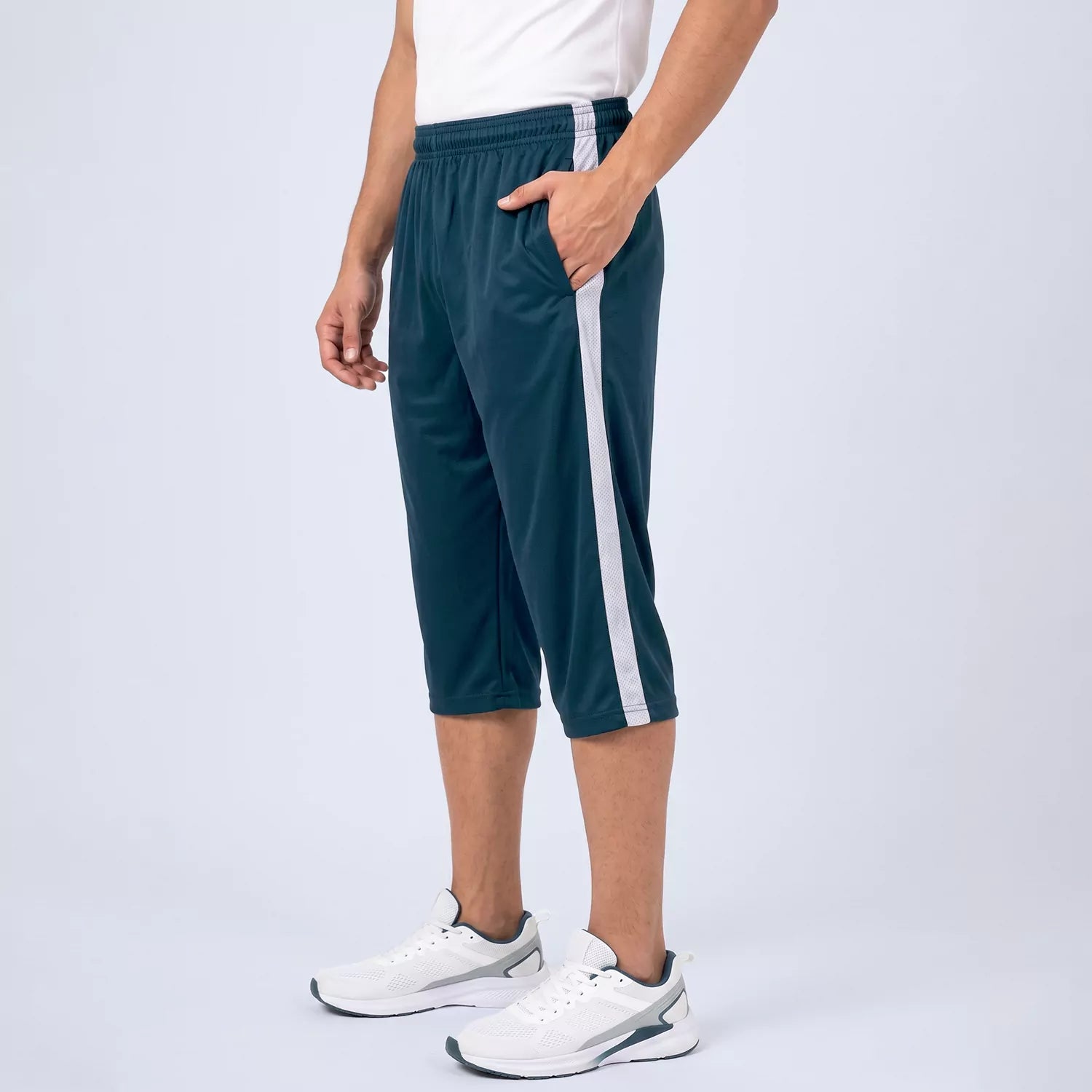 Side view of the Pace Panel training shorts showing the full-length contrast panel and regular fit
