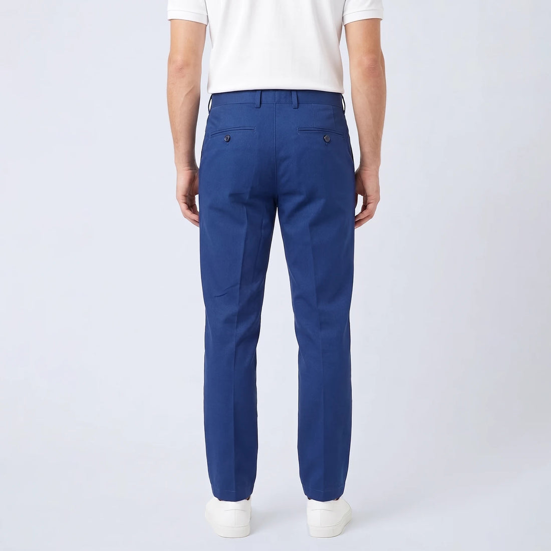 Parline Golf Pant in navy blue, front view showing the belt-loop waistband, button-and-fly closure, and slant pockets.
