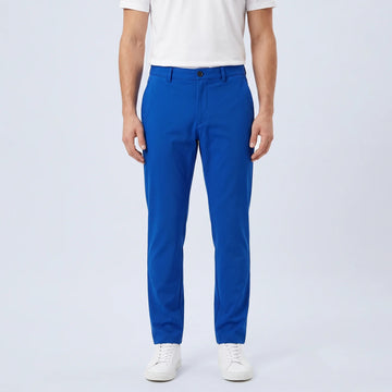 Parline Golf Pant in royal blue, front view showing the belt-loop waistband, button-and-fly closure, and slant pockets.