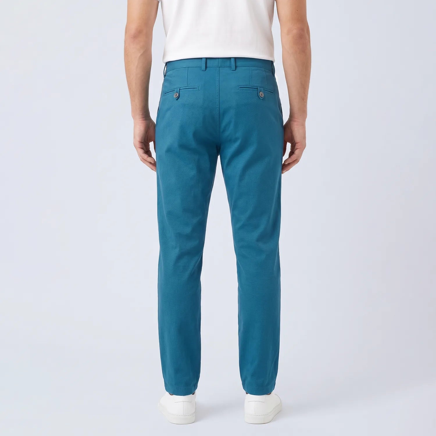 Parline Golf Pant in teal, back view showing the back pockets and tailored cut through the seat and legs.
