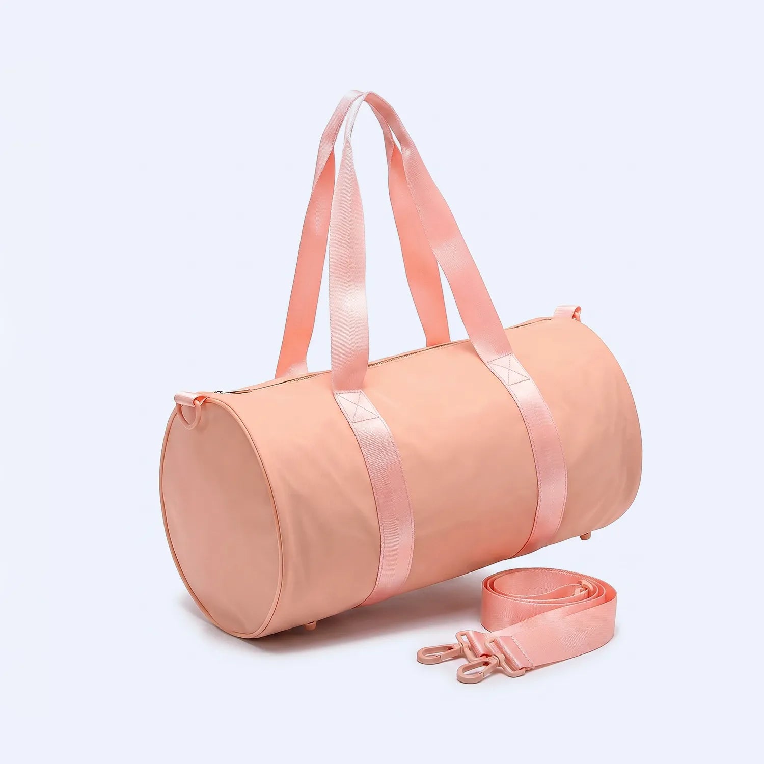 Pink duffel bag with a strap